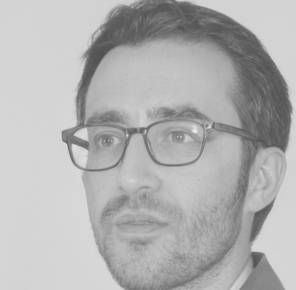 Portrait of Dr. Kasem Thanakit, senior financial audit instructor and program director